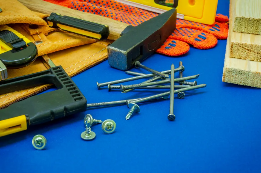 Professional tool for joiner and spare parts on a blue background.